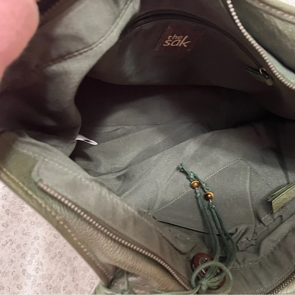 Olive green leather shoulder bag by The Sak
